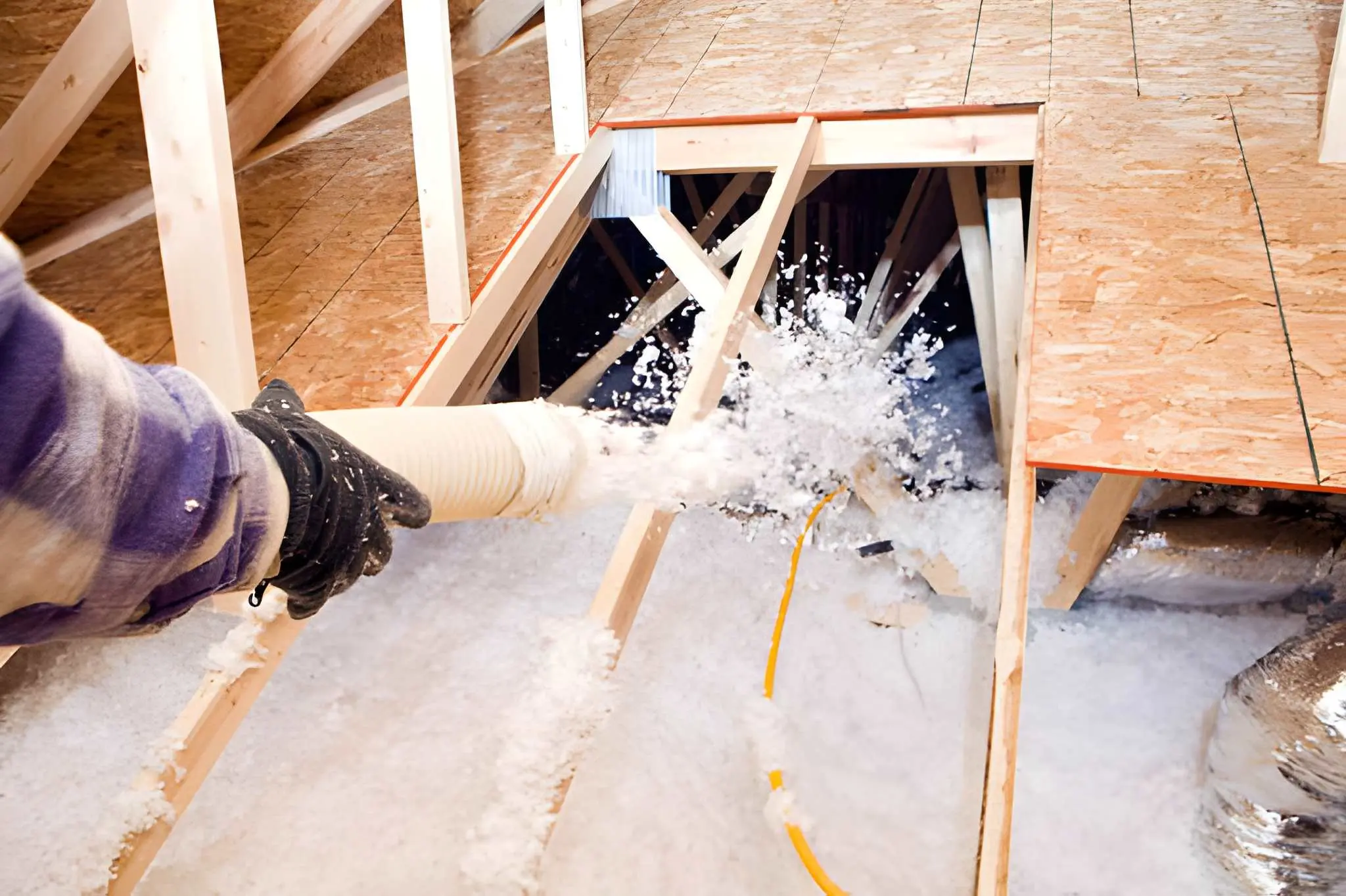 Attic Insulation helping reduce heat loss and energy costs